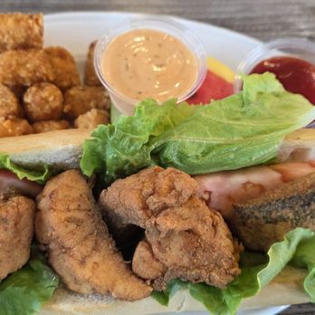 Headwaters Seafood & Grille - Rock fish poor boy - Seafood Near Me - Easton, Maryland Headwaters Seafood & Grille - Rock fish poor boy - Seafood Near Me - Easton, Maryland