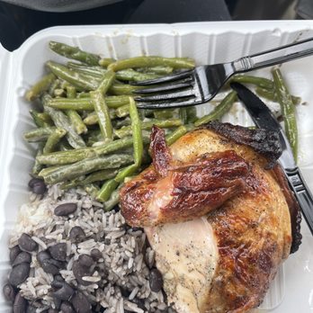 Alpaca Chicken - 1/4 white with green beans, rice and black beans on top. Not pictured is the Valentinas hot sauce and house made yellow sauce. SO GOOD! - Peruvian Near Me - Raleigh, North Carolina