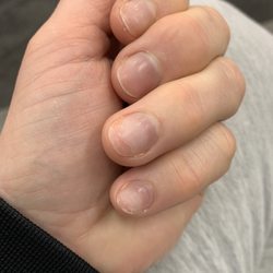 Nails & Co. Spa - Beverly - Soak off gel base still visible on index and pinky finger