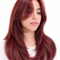 Hair Club 20 Arcadia - Bleached hair color and long layered haircut with face framing curtain bangs