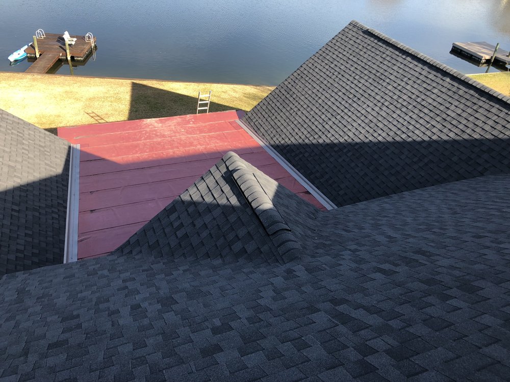 Slide of Canaan roofing and gutters