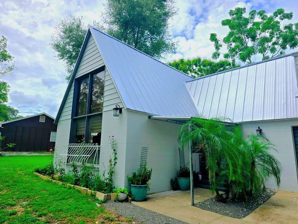 Slide of Bruzz Roofing