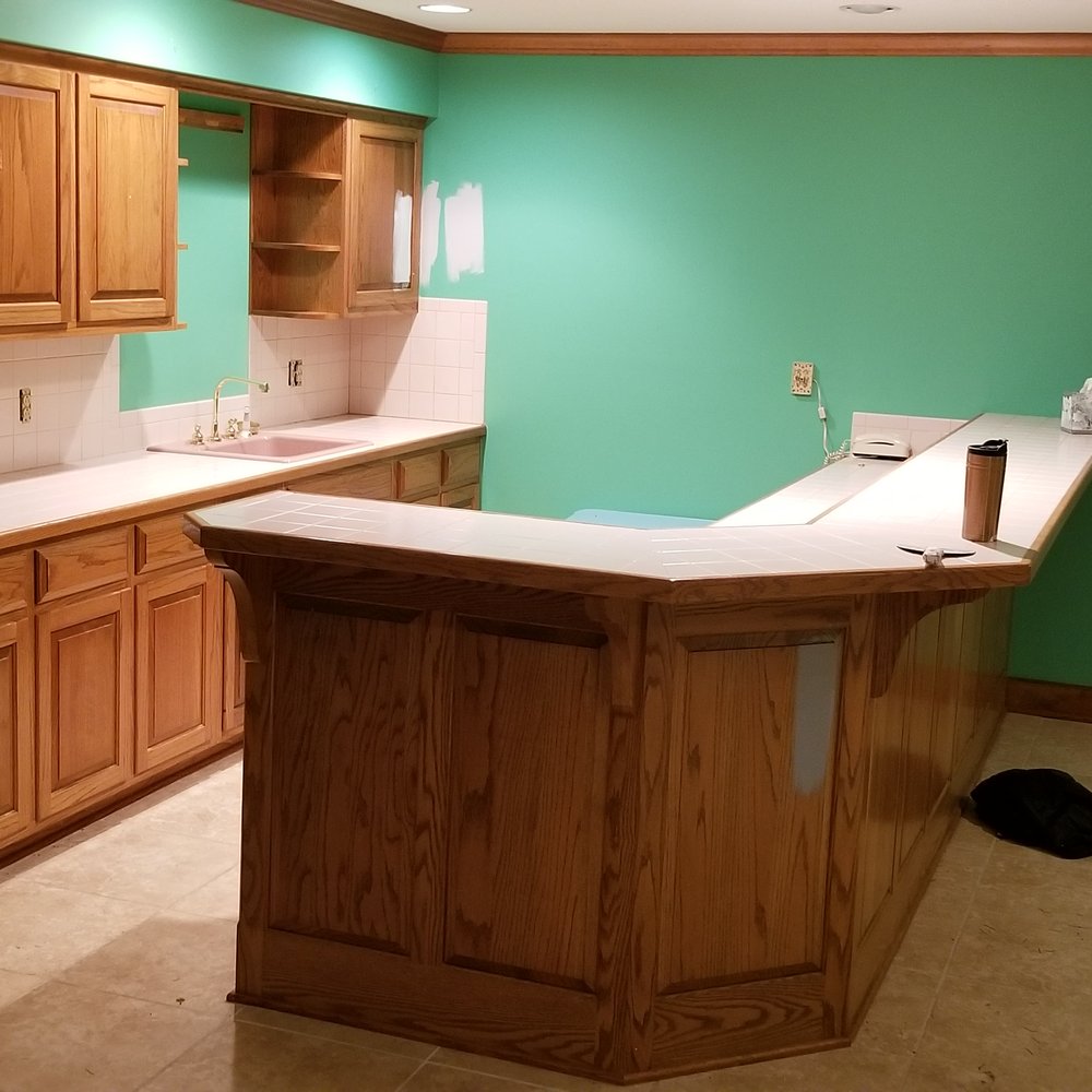 Covered Painting - The whole basement looked like this before Will arrived. - Painters Near Me Covered Painting - The whole basement looked like this before Will arrived. - Painters Near Me