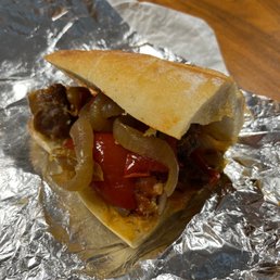 Half of my sausage and peppers Half of my sausage and peppers