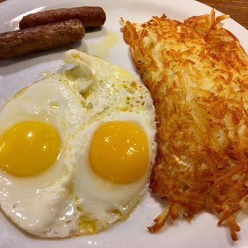 Denny's - Cinnamon Roll Pancake Breakfast: Served with 2 eggs, hash browns and choice of 2 piece bacon or sausage - American Near Me - Reno, Nevada