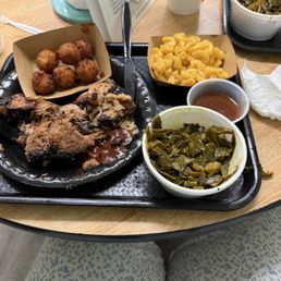 Bbq, brisket, collard greens and mac and cheese. Hush puppies Bbq, brisket, collard greens and mac and cheese. Hush puppies