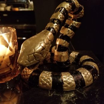 Foreign National - Snake on the counter - Cocktail Bars Near Me - Seattle, Washington