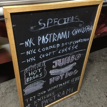 Deli & Dogz - a blackboard with a menu on it - Food Trucks Near Me Deli & Dogz - a blackboard with a menu on it - Food Trucks Near Me