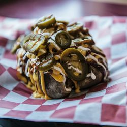 Deep South - Monster Potato......a huge potato smothered in pulled pork, cheese, sour cream, bbq sauce and jalapenos!