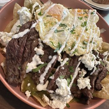 Sunny Side Cafe - green chilaquiles with rib eye steak - Breakfast & Brunch Near Me - Seal Beach, California Sunny Side Cafe - green chilaquiles with rib eye steak - Breakfast & Brunch Near Me - Seal Beach, California