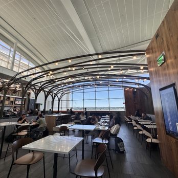 The Centurion Lounge - Inside -bar to the left - Airport Lounges Near Me - Seattle, Washington