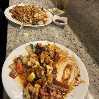 ADV Forest Grill - The 1st plate is the spicy chicken, it was bomb. I couldn't wait to eat so excuse the picture lol then the far plate was steak yakisoba. - Japanese Near Me - Andover, Kansas ADV Forest Grill - The 1st plate is the spicy chicken, it was bomb. I couldn't wait to eat so excuse the picture lol then the far plate was steak yakisoba. - Japanese Near Me - Andover, Kansas