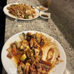 ADV Forest Grill - The 1st plate is the spicy chicken, it was bomb. I couldn't wait to eat so excuse the picture lol then the far plate was steak yakisoba.