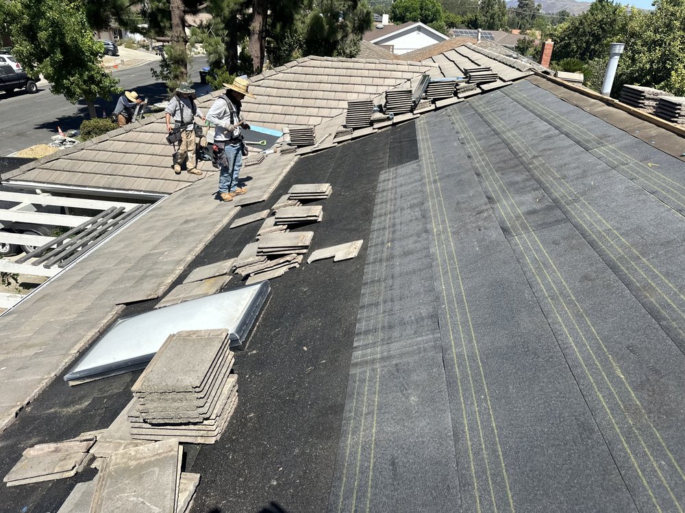 Slide of Twins Roofing