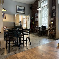 Cajun Depot Grill - Dining room and looking toward the bar entrance from booth closest to the door