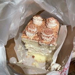 Babushka Deli & Bakery - Russian cake (Koko...?) with meringue and a light cream center and candied pecans crushed on top.