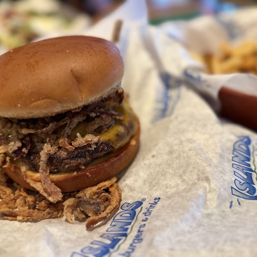 Island burger, onion strings added.