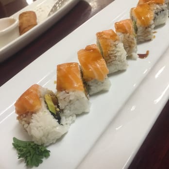 Thai Pepper - Sneaky Salmon Roll - BBQ eel, avocado, and tempura flakes topped with fresh salmon - Pan Asian Near Me - Warner Robins, Georgia Thai Pepper - Sneaky Salmon Roll - BBQ eel, avocado, and tempura flakes topped with fresh salmon - Pan Asian Near Me - Warner Robins, Georgia