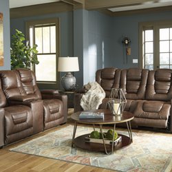 A-1 Furniture - This set features power recliners with power headrests and drop down console built into sofa middle seat back with USB charging ports