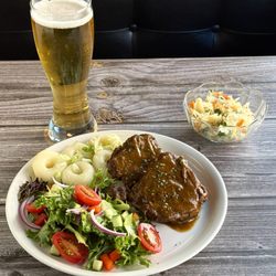 Retro Polish Restaurant - Slow Roasted Pork Shoulder, served with Silesian Dumplings