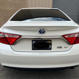 2015 White Camry was hit by the license plate of another car and left 4 perforations. 2015 White Camry was hit by the license plate of another car and left 4 perforations.