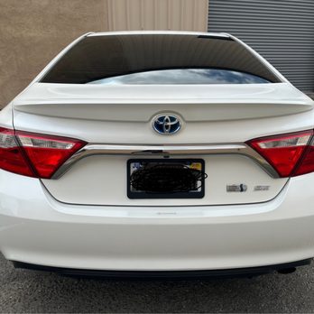 Precision Body Shop & Detail - 2015 White Camry was hit by the license plate of another car and left 4 perforations. - Auto Detailing Near Me - Colma, California