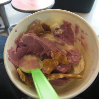 Yogurtini - raspberry pomegranate and regular tart with waffle cone topping - Ice Cream & Frozen Yogurt Near Me - Las Vegas, Nevada Yogurtini - raspberry pomegranate and regular tart with waffle cone topping - Ice Cream & Frozen Yogurt Near Me - Las Vegas, Nevada