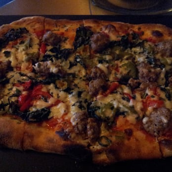 Serious Pie Downtown - Fennel sausage pizza with add-on kale - Pizza Near Me - Seattle, Washington