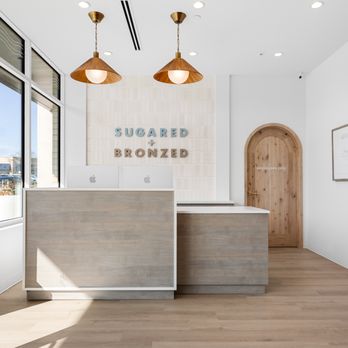 SUGARED + BRONZED - SUGARED + BRONZED Suburban Square Reception Desk - Tanning Near Me - Ardmore, Pennsylvania SUGARED + BRONZED - SUGARED + BRONZED Suburban Square Reception Desk - Tanning Near Me - Ardmore, Pennsylvania