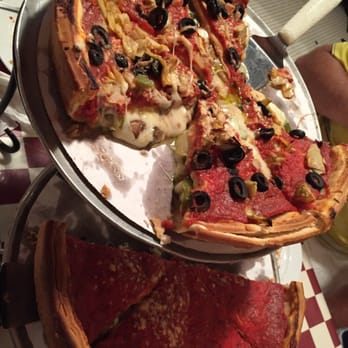 Giordano's - Delicious. Top is the veggie deep dish, bottom is the special deep dish - Pizza Near Me - Kissimmee, Florida Giordano's - Delicious. Top is the veggie deep dish, bottom is the special deep dish - Pizza Near Me - Kissimmee, Florida