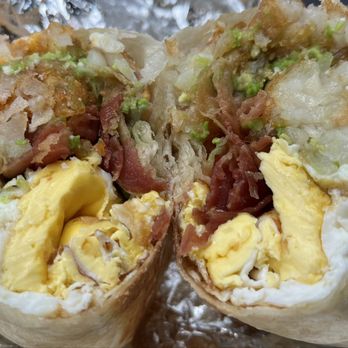 The Rooster - Rico Suave. Eggs, bacon, cheese, tots, and sauces on the side. Very good. - Food Trucks Near Me - Los Angeles, California The Rooster - Rico Suave. Eggs, bacon, cheese, tots, and sauces on the side. Very good. - Food Trucks Near Me - Los Angeles, California