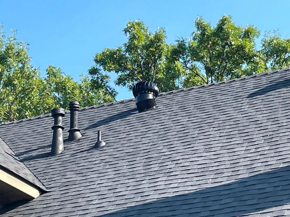 Slide of Trinity Roofing Solutions