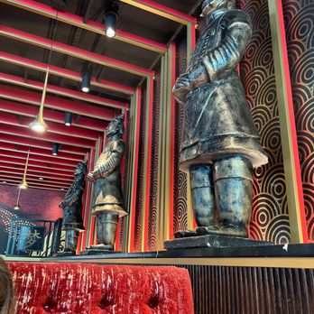 P.F. Chang's - a statue of a man and a woman - Chinese Near Me - Houston, Texas P.F. Chang's - a statue of a man and a woman - Chinese Near Me - Houston, Texas