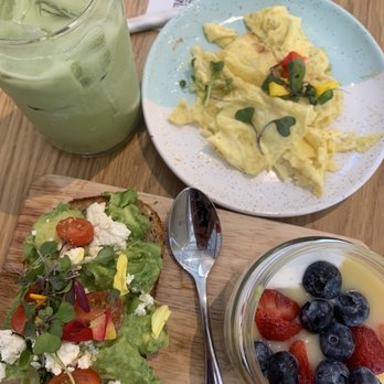 Bluestone Lane - Brekkie Board, Iced Matcha Latte, Side of Scrambled Eggs - Coffee & Tea Near Me - Orange, California Bluestone Lane - Brekkie Board, Iced Matcha Latte, Side of Scrambled Eggs - Coffee & Tea Near Me - Orange, California