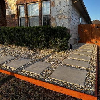 Isaias Gonzalez Landscaping - a front yard with a stone walkway - Landscaping Near Me Isaias Gonzalez Landscaping - a front yard with a stone walkway - Landscaping Near Me