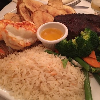 Fernandes steakhouse - 12oz filet mignon, lobster tail, rice, vegetables & potato chips - Portuguese Near Me - Newark, New Jersey