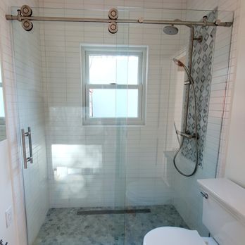 Texas Bmc Remodeling - Shower & Bathtub Converted Into Stand Alone Shower. Shower Remodeling. Frameless Sliding Shower Door Installation.

Houston, Texas - General Contractors Near Me