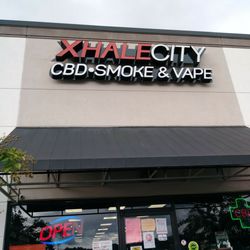 Xhale City - Store front and sign