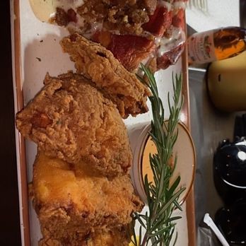 Just Spoons Cafe - Fried salmon, red velvet waffles, grits with cheese and eggs (grits on the side) - Comfort Food Near Me - Plantation, Florida