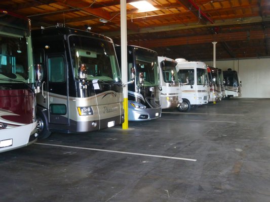 RV STORAGE & DETAILING - 24 HOUR RECREATIONAL STORAGE
Storage For Every Budget
24 H.R.S. offers Indoor and Outdoor storage. We offer services such as, wash, tanks dumped, housekeeping shampoo carpets, detail, fiberglass repair, paint and engine work. All of these services are priced and billed on an as needed or wanted basis. We are located at 3500 Cincinnati Ave, Suite 200, Rocklin, Calif. We have over 200,000 sq ft of indoor storage as well as 10 plus acres of outdoor storage facilities.

• Secure Facility with state of the art security system
• Indoor customers have a 24 hr accessible drop off / pick up yard
• Registered Keyless gate entry
• Outdoor customers have 24 hr access to their numbered location


Incoming Services:
Dump grey & black water
Back flush & add chemicals
Exterior wash from drip rail down
Unit parked inside
Turn off batteries
Open fridge & freezer
Turn off propane
Open vent for circulation
Outgoing Services:
Turn on batteries
Start fridge & freezer
Close vents
Check tire PSI & fill if needed
Fill fresh water to specified amount
Free ice for your ice chest
Option to receive goods from delivery service
Additional Services:
Housekeeping
Detailing
Mechanical & Maintenance repair
Fiberglass repair
Paint & body repair
Tire repair & replacement
Battery replacement
Hook up to electircal spot