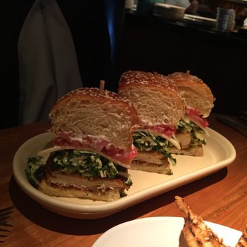 The Honor Bar - Crispy Chicken Sandwich. Spicy Slaw. Tomato. Swiss Cheese. Home made Torta - New American Near Me - Palm Beach, Florida The Honor Bar - Crispy Chicken Sandwich. Spicy Slaw. Tomato. Swiss Cheese. Home made Torta - New American Near Me - Palm Beach, Florida
