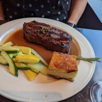 Russell's - NY Strip with scalloped potatoes and squash - Steakhouses Near Me - Vail, Colorado
