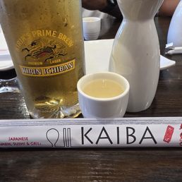 Hot sake and a beer to start off our lunch. Great service and great vibes.