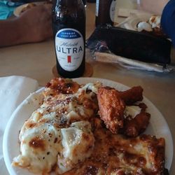 Tailgator's - Complementary pizza and wings during the Bears halftime.