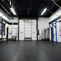 RADD - Group class area and garage door at RADD Fitness