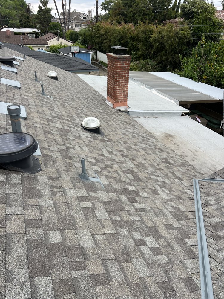 Slide of Heritage Roofing Solutions