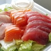 Photo of Ahi & Vegetable - Honolulu, HI, United States. Sashimi Salad with house dressing. Ahi, salmon and hamachi. This is my absolute favorite.