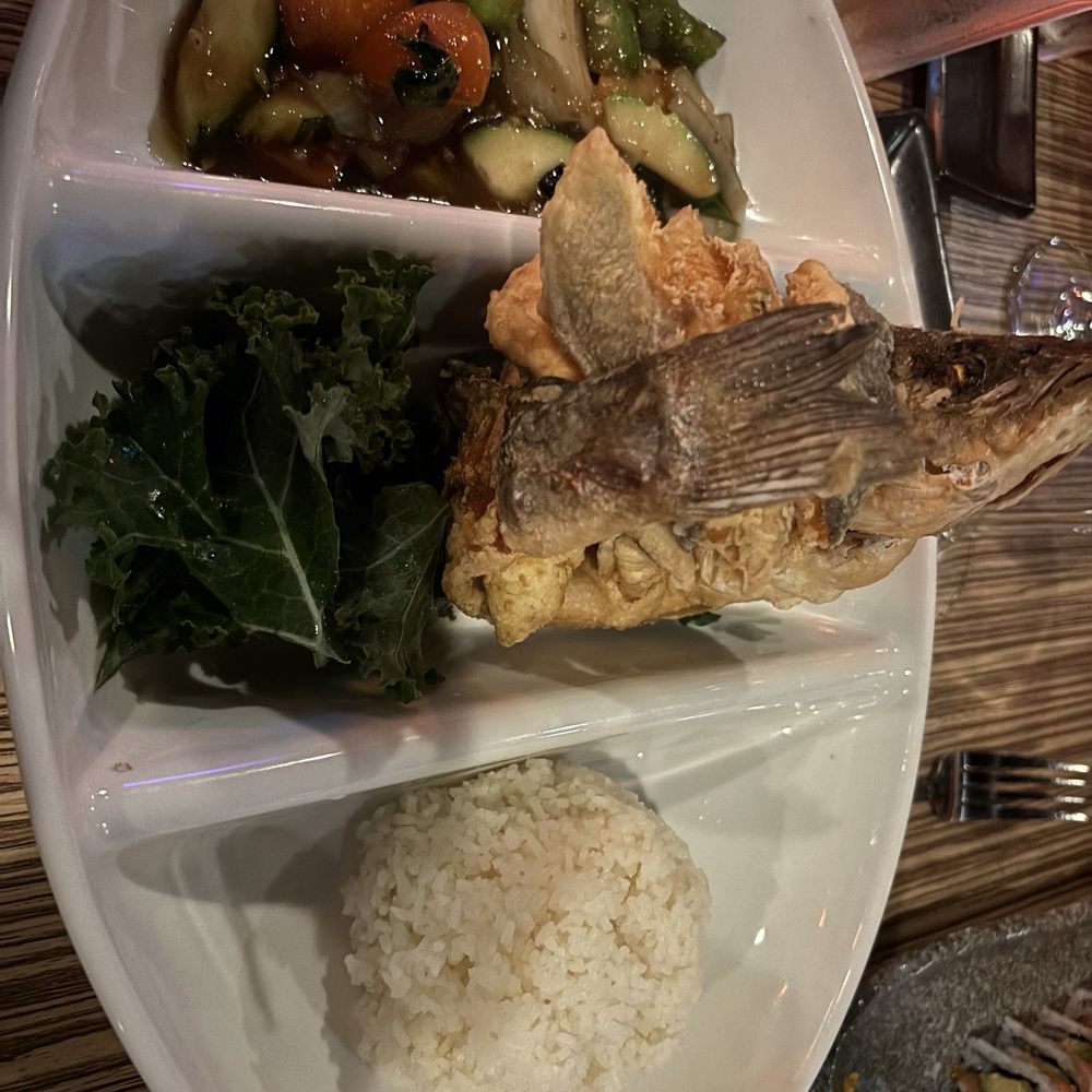 Noutta Sushi And Thai - Whole Fried Bronzino with rice and veggies in a Basil sauce - Sushi Bars Near Me - Delray Beach, Florida Noutta Sushi And Thai - Whole Fried Bronzino with rice and veggies in a Basil sauce - Sushi Bars Near Me - Delray Beach, Florida