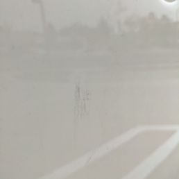 The damaged on the left door of my car. The damaged on the left door of my car.
