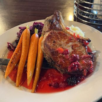 Toomey's - Pork chop in a mixed berry sauce, purple cabbage, carrots, and mashed potatoes... - New American Near Me - Mammoth Lakes, California Toomey's - Pork chop in a mixed berry sauce, purple cabbage, carrots, and mashed potatoes... - New American Near Me - Mammoth Lakes, California